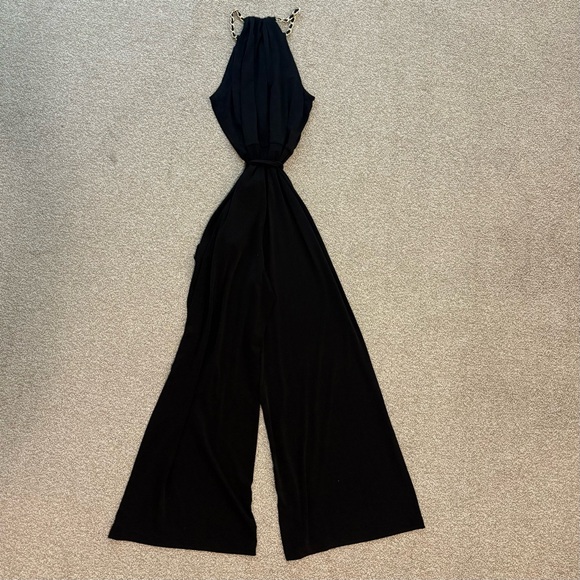 Chic Black Jumpsuit with Gold Chain Straps - Picture 2 of 2